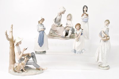 Lot 111 - NAO; six figures comprising three girls, a...
