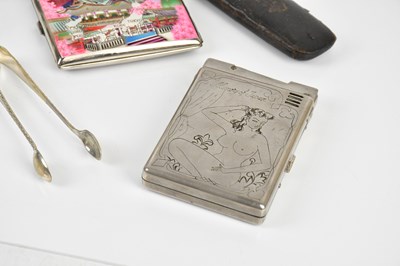 Lot 1366 - A small collectors' lot comprising a Zippo USS...