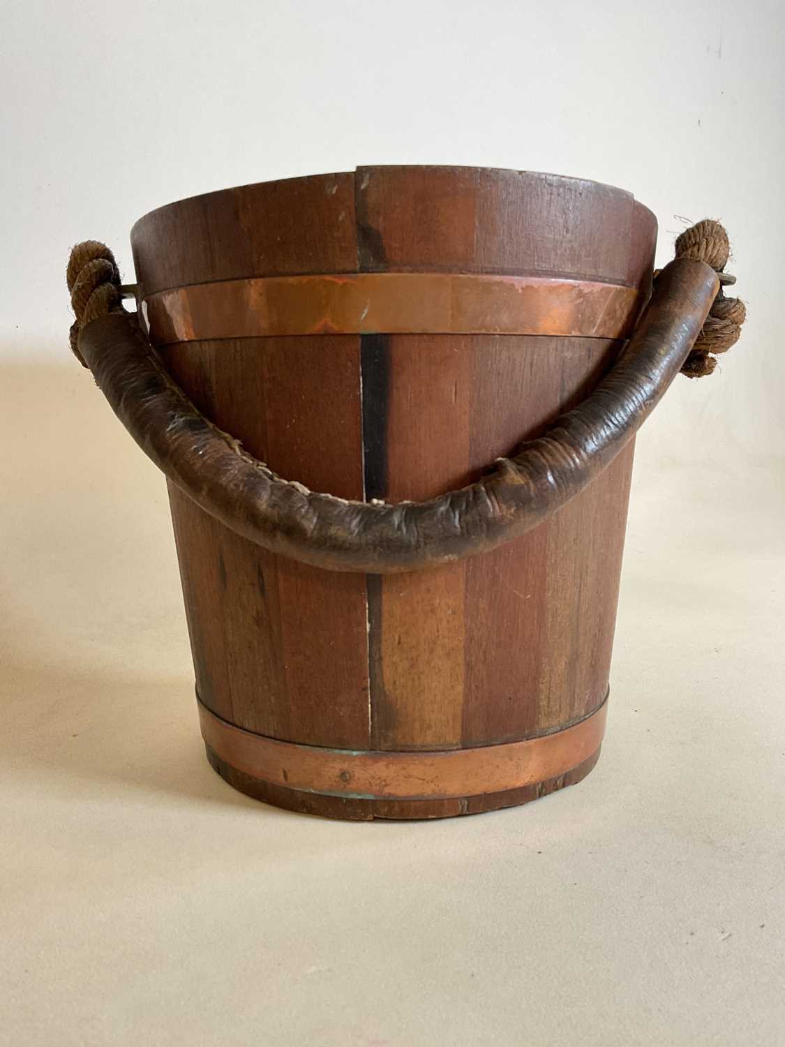 Lot 35 A vintage coopered wooden bucket with