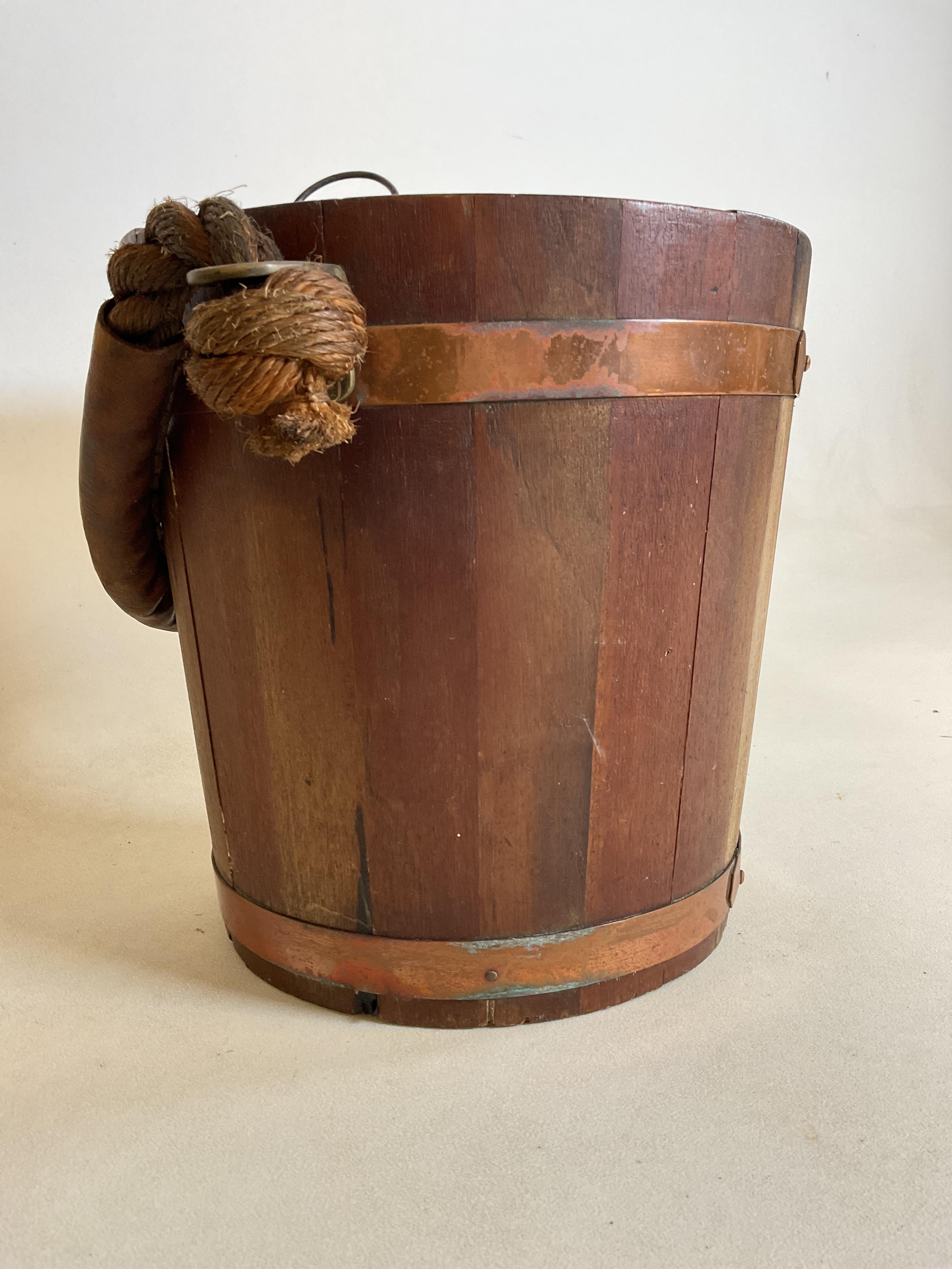 Lot 35 A vintage coopered wooden bucket with