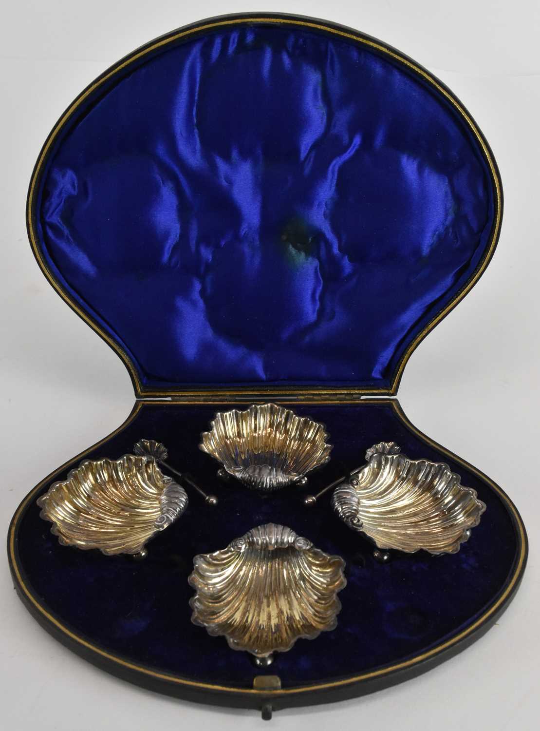 Lot 1149 - A cased set of four Victorian salt dishes in...