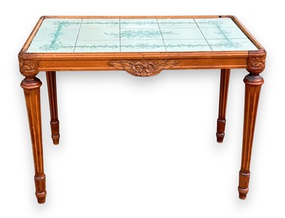 Lot 2223 - A French style walnut framed tea table of...