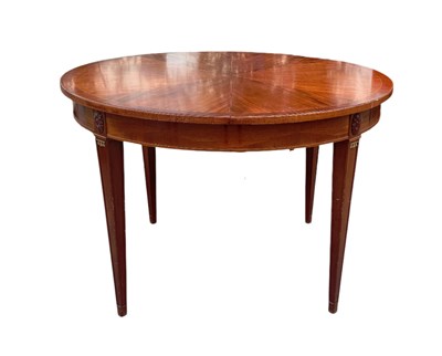 Lot 2238 - A Continental mahogany circular extending...