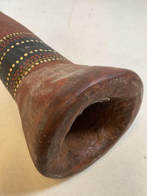 Lot 52 - An Aboriginal didgeridoo with three bands of...