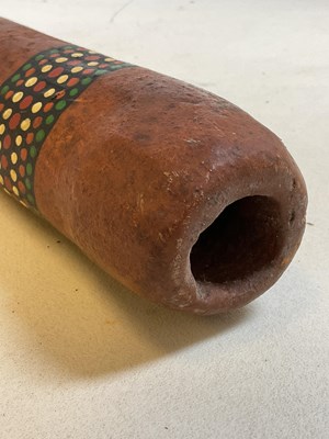 Lot 52 - An Aboriginal didgeridoo with three bands of...