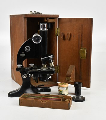 Lot 2472 - BECK, LONDON; a military microscope, cased,...