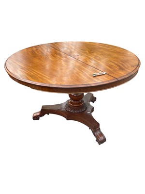 Lot 2181 - A large mahogany coffee table with circular...