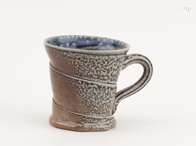 Lot 699 - WALTER KEELER (born 1942); a salt glazed mug,...