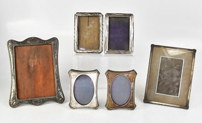 Lot 590 - Five silver photograph frames, including a...