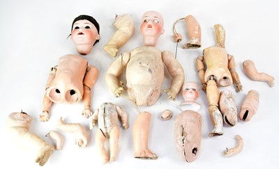 Lot 457 - Various doll parts, including a...
