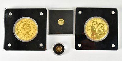 Lot 977 - Four gold coins, comprising two 24ct coins,...