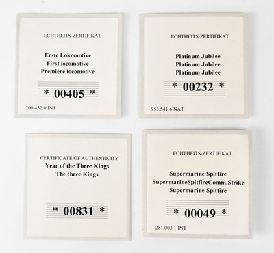 Lot 977 - Four gold coins, comprising two 24ct coins,...