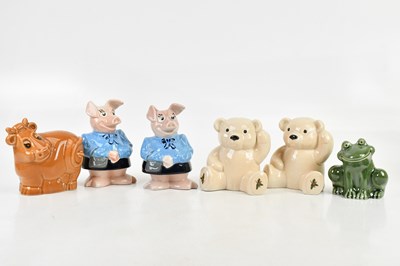 Lot 226 - WADE; a collection of six money boxes...