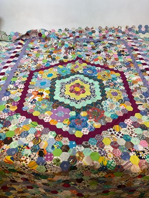 Lot 176 - A vintage unfinished patchwork quilt.