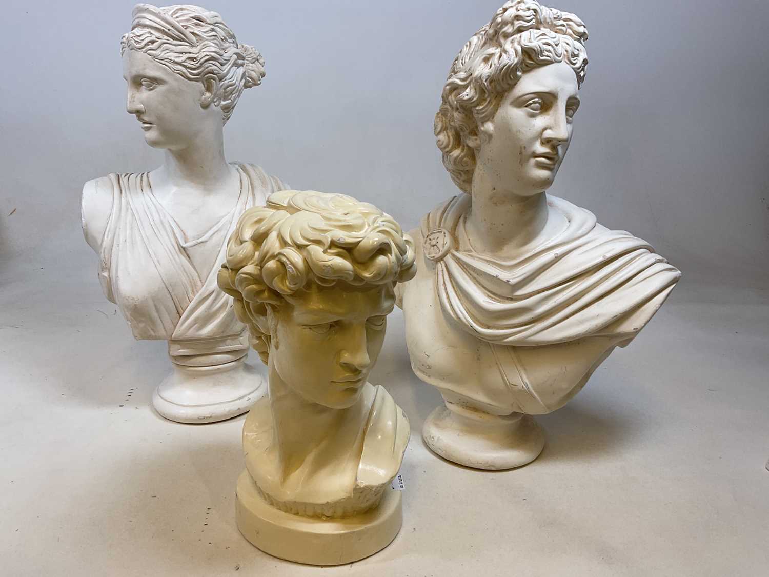 Lot 213 - A pair of decorative painted plaster busts