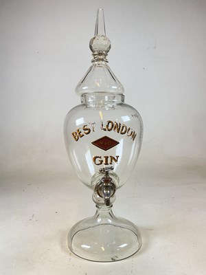 Lot 105 - A large advertising clear glass gin dispenser...