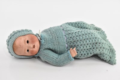 Lot 2099 - A M GERMANY; a bisque headed doll, 351/3K, 34cm.