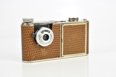 Lot 2474 - PETIE; a West German vanity camera, with faux...