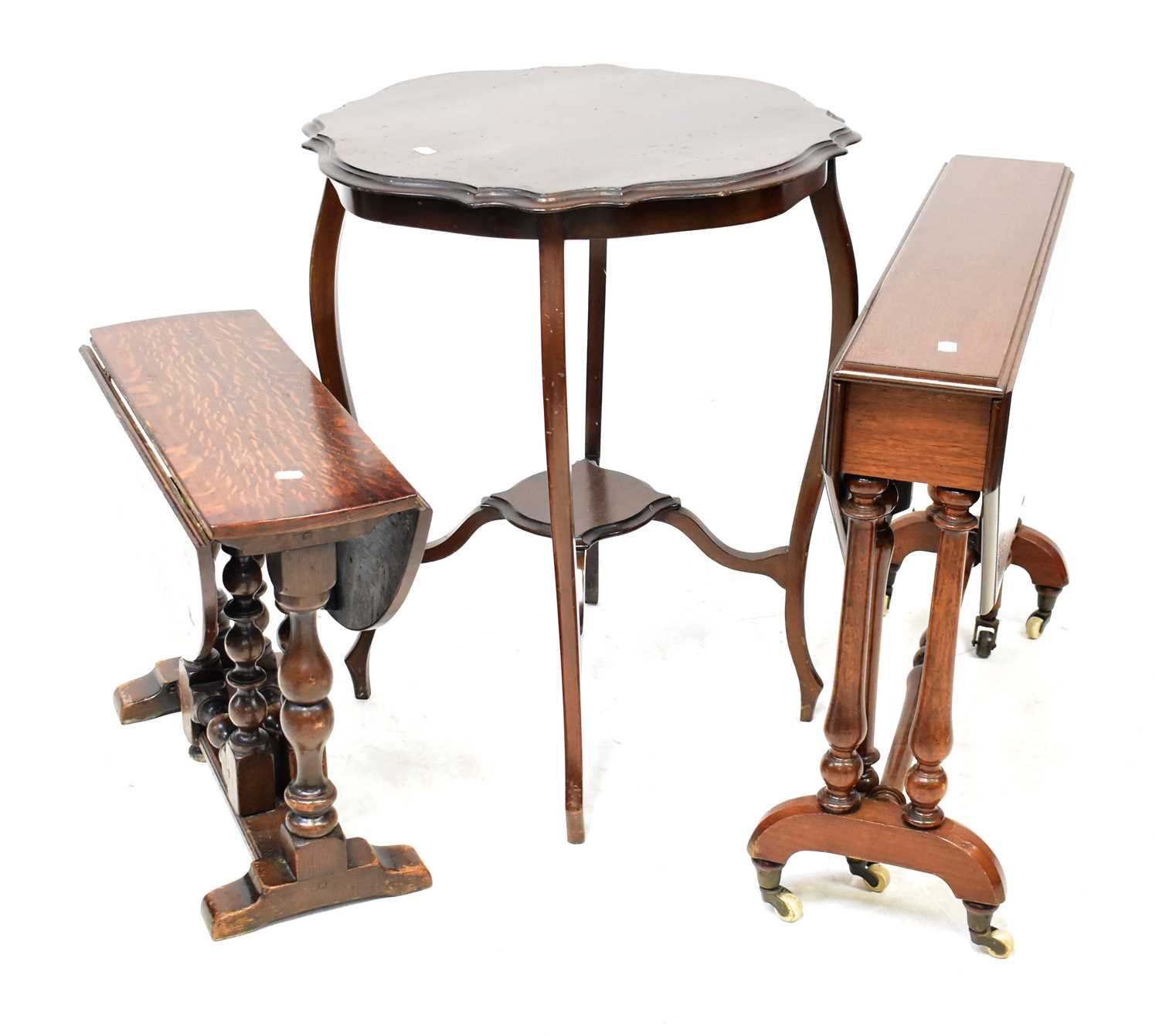 Lot 47 - A mahogany octagonal Sutherland table, raised...