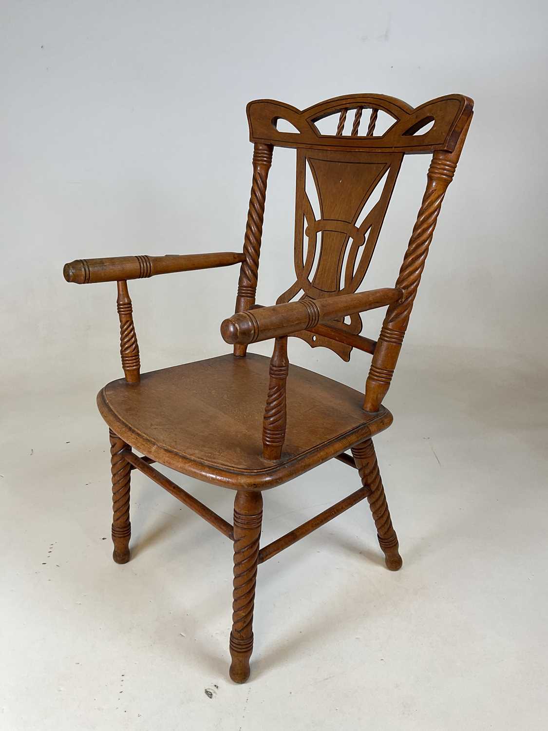 Lot 826 - A early 20th century American child's elbow...