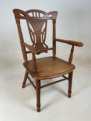 Lot 826 - A early 20th century American child's elbow...