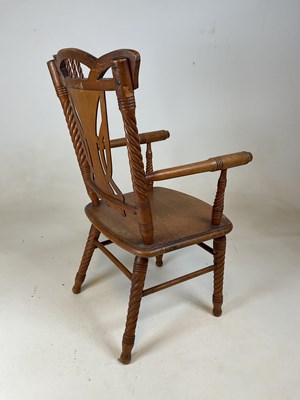 Lot 826 - A early 20th century American child's elbow...