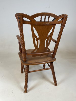 Lot 826 - A early 20th century American child's elbow...