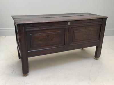 Lot 1066 - A 17th century panelled oak coffer, dated 1690,...