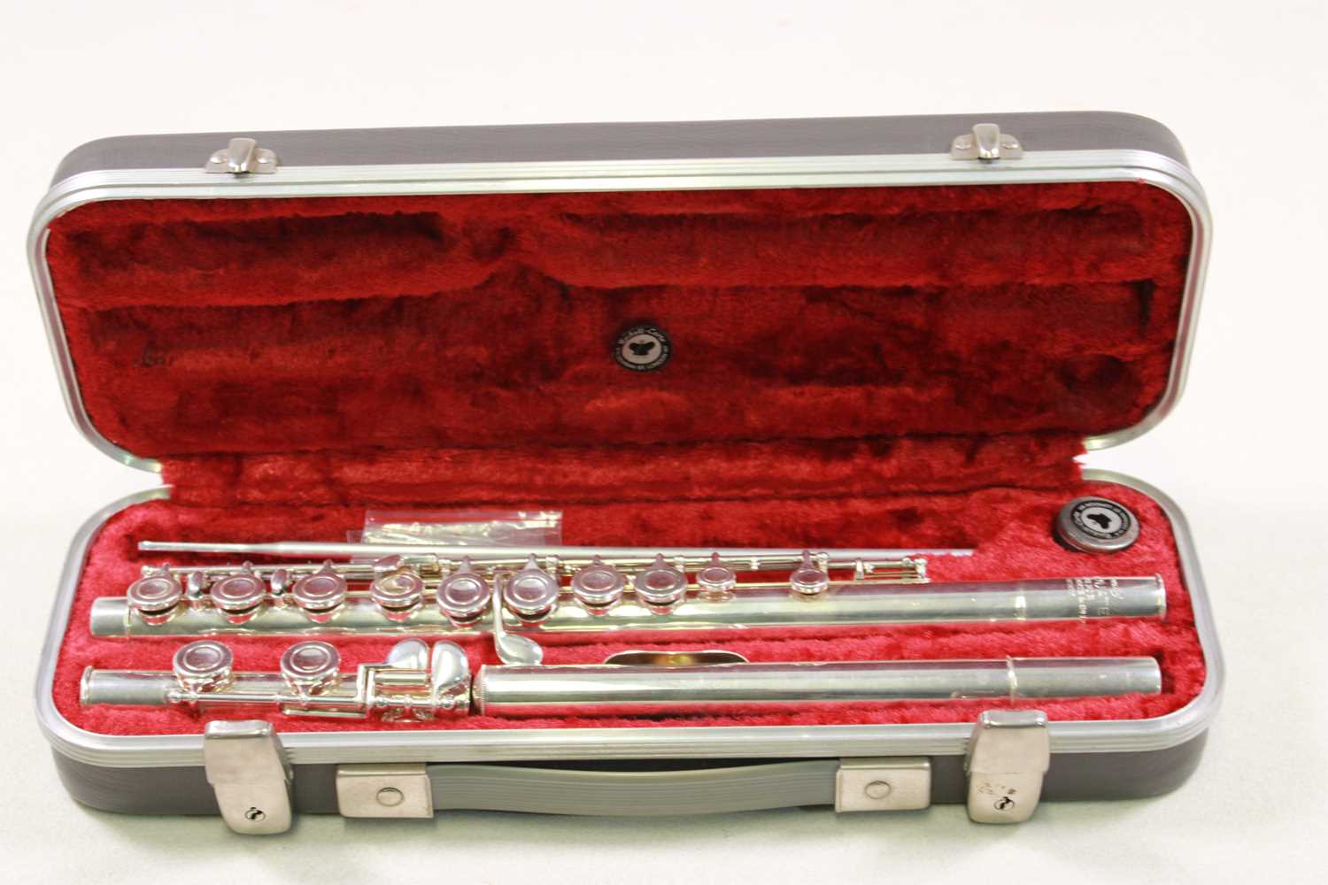 Lot 120 - ROMILLY; a cased graduate flute.