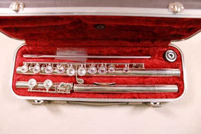 Lot 120 - ROMILLY; a cased graduate flute.