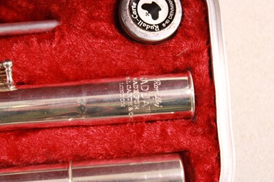Lot 120 - ROMILLY; a cased graduate flute.