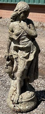 Lot 678 - A well weathered garden statue of a female...
