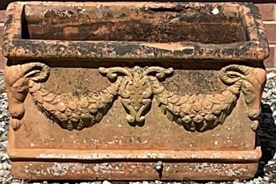 Lot 679 - A terracotta planter decorated with swags, 36...