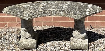 Lot 674 - A reconstituted garden seat, the base formed...