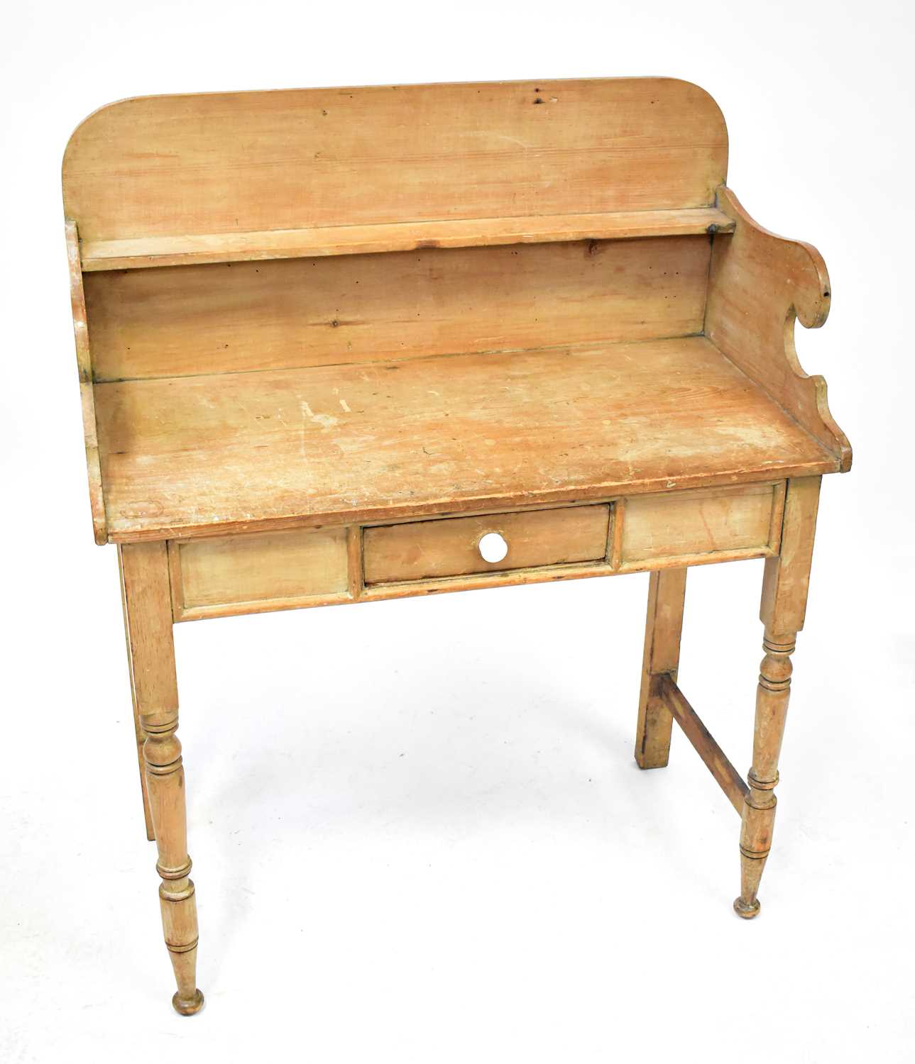 Lot 33 - A Victorian pine washstand with gallery back...
