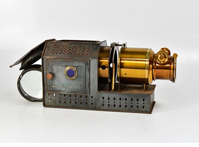 Lot 433 - A brass and metal cased magic lantern in metal...
