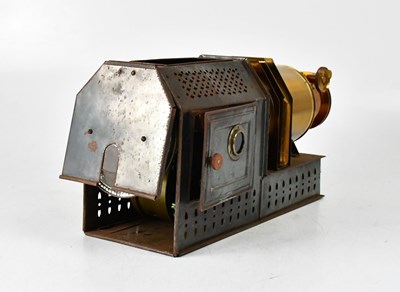 Lot 433 - A brass and metal cased magic lantern in metal...