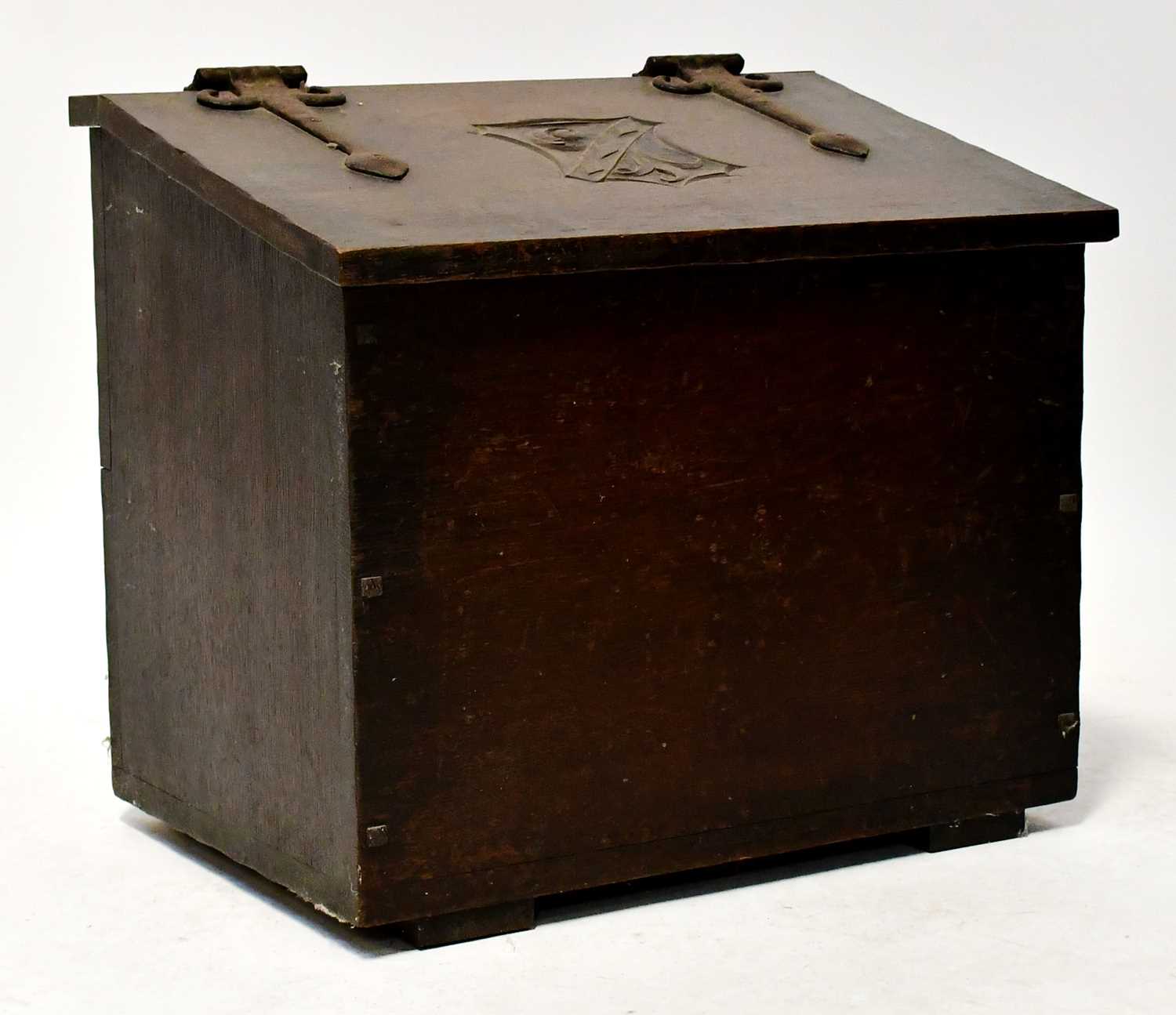 Lot 29 - An oak coal/slipper box.