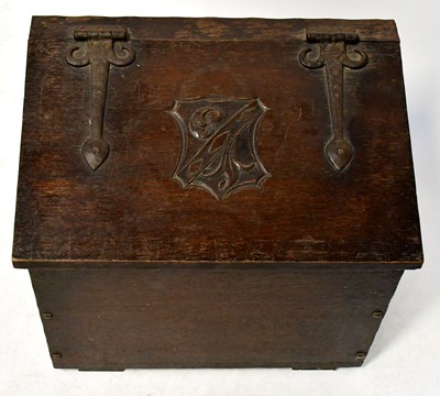 Lot 29 - An oak coal/slipper box.