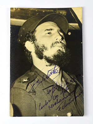 Lot 739 - FIDEL CASTRO; a black and white photograph...