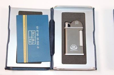 Lot 85 - THE ORIENT EXPRESS; a boxed lighter, with...