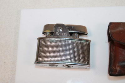 Lot 85 - THE ORIENT EXPRESS; a boxed lighter, with...