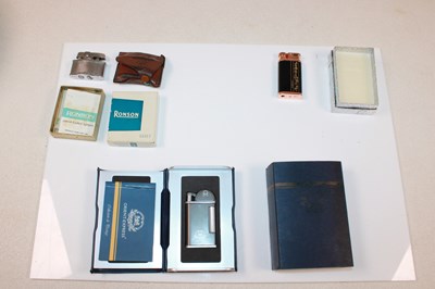 Lot 85 - THE ORIENT EXPRESS; a boxed lighter, with...
