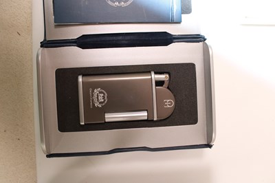 Lot 85 - THE ORIENT EXPRESS; a boxed lighter, with...