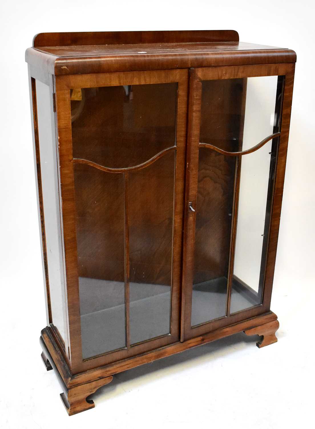 Lot 37 - A 1930s mahogany display cabinet with glazed...