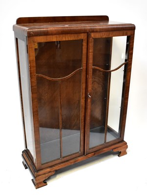 Lot 37 - A 1930s mahogany display cabinet with glazed...
