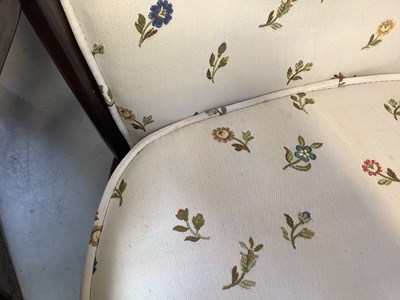 Lot 9 - ERCOL; a dark stained elm open arm chair with...