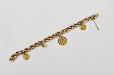 Lot 19 - A yellow metal curb link bracelet, clasp...