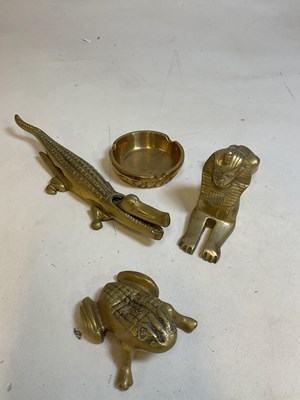 Lot 203 - Four brass ornaments comprising crocodile,...