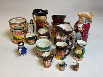 Lot 263 - A group of character jugs including Sandland...